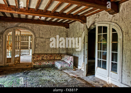 South of Kortrijk in Belgium, lies a small village called Walleweg. It is here that a house once fit for a Baroness now decays. Stock Photo