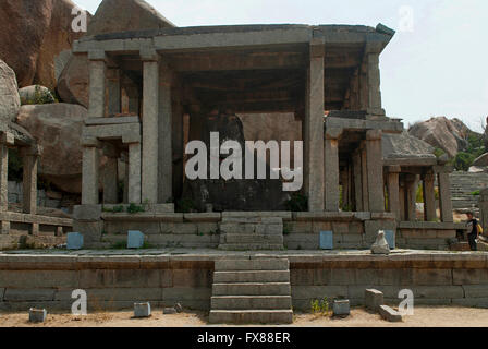 A large monolithic Nandi bull at the eastern end of the Hampi Bazaar, Hampi, Karnataka, India. Sacred Center. Stock Photo