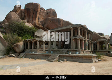 A large monolithic Nandi bull at the eastern end of the Hampi Bazaar, Hampi, Karnataka, India. Sacred Center. Stock Photo