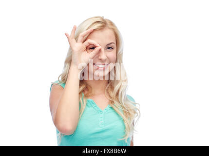 young woman making ok hand gesture Stock Photo