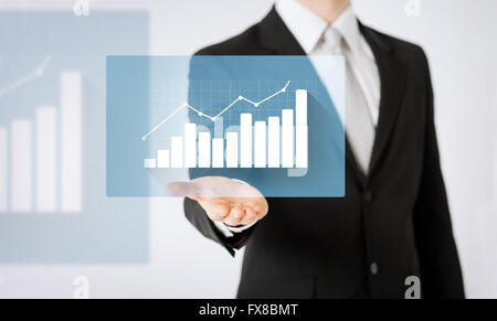 close up of man hand showing diagram chart Stock Photo
