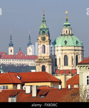 Prague, Czech Republic. St Nicholas Church (Kostel svatého Mikuláše - 1755, Baroque) in Mala strana, seen from across the river. Stock Photo