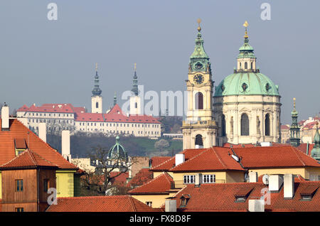 Prague, Czech Republic. St Nicholas Church (Kostel svatého Mikuláše - 1755, Baroque) in Mala strana, seen from across the river. Stock Photo