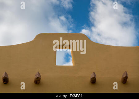 Pueblo style architecture against a blue sky in Mexico. Stock Photo