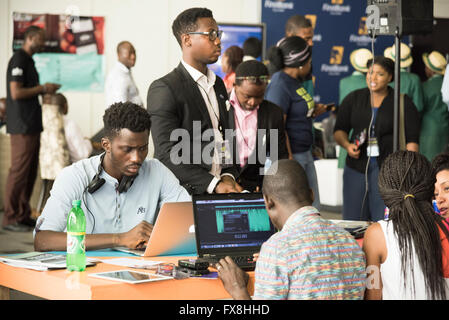 Young Nigerian people using technology at Social Media Week business conference in Lagos Nigeria Stock Photo