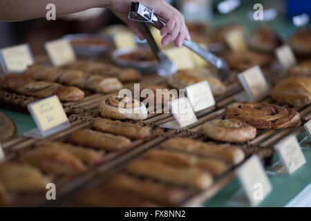 Danish Pastries along with other pastries form a counter display at a small bakery in Cebu City,Philippines. Stock Photo