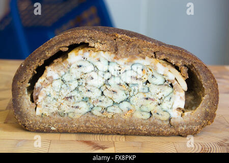 Kalakukko, traditional food from the Finnish region of Savonia made from fish baked inside a loaf of bread Stock Photo