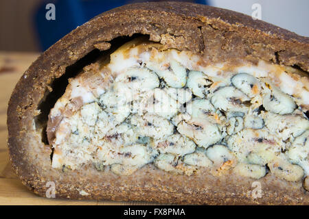 Kalakukko, traditional food from the Finnish region of Savonia made from fish baked inside a loaf of bread Stock Photo