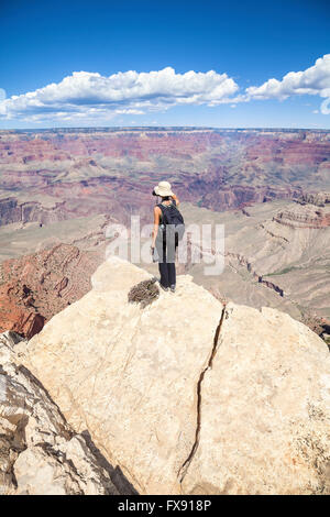 Young woman on the edge of canyon in Cappodocia Stock Photo - Alamy