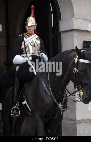 British soldier of the Blues and Royals regiment mounted on horseback Stock Photo