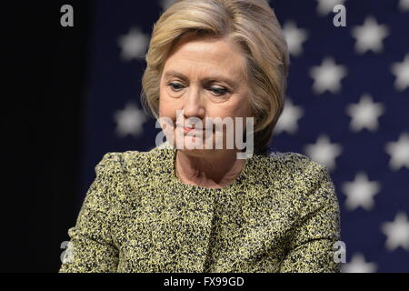 Port Washington, New York, USA. 11th April 2016. HILLARY CLINTON, leading Democratic presidential primary candidate, purses her lips during a discussion on gun violence prevention with Rep. S. Israel, and with activists who lost family members due to shootings. The activists shared their stories of personal loss, and Hillary Clinton, the former Secretary of State and U.S. Senator from New York, called for stronger gun legislation and vowed to take on the gun lobby NRA National Rifle Association. Credit:  Ann E Parry/Alamy Live News