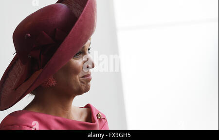 Munich, Germany. 13th Apr, 2016. Queen Maxima of the Netherlands smiles as she pays a visit to MINI-Showroom of BMW in Munich, Germany, 13 April 2016. The Dutch Royal couple is on a two- day visit to Bavaria. PHOTO: ANGELIKA WARMUTH/dpa/Alamy Live News Stock Photo