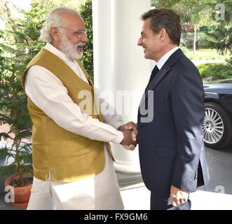 New Delhi, India. 13th Apr, 2016. Indian Prime Minister Narendra Modi welcomes former French President Nicolas Sarkozy at his residence at Race Course Road April 13, 2016 in New Delhi, India. Credit:  Planetpix/Alamy Live News