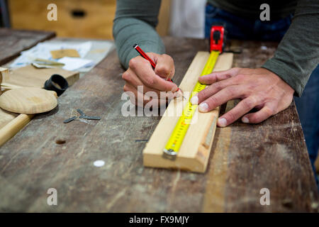 Carpenter working on his craft Stock Photo