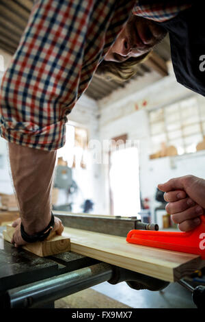 Carpenter working on his craft Stock Photo