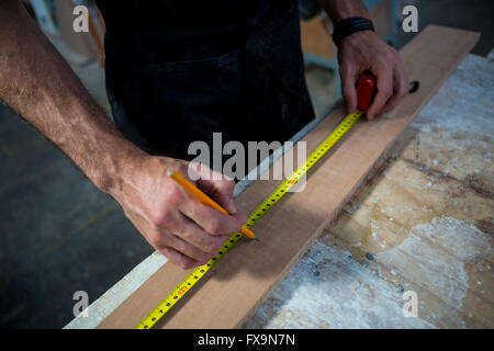 Carpenter working on his craft Stock Photo