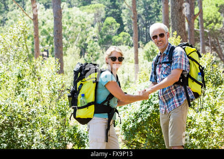senior couple standing hand in hand Stock Photo