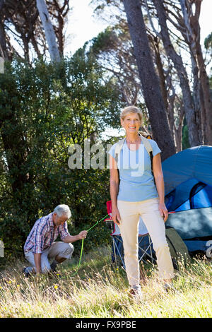 Mature couple preparing hike Stock Photo