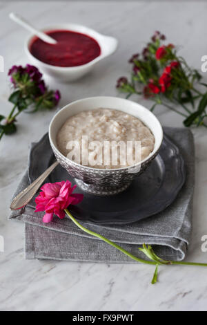 Dairy-free rice pudding cooked in almond milk Stock Photo