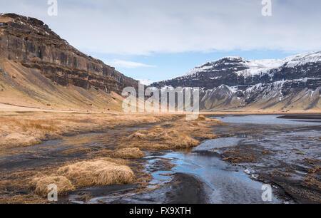 Typical Icelandic mountain landscape in Southeast Iceland  with river flowing through mountains Stock Photo