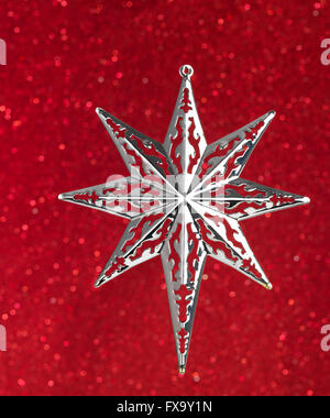 Christmas Star Decoration on red Stock Photo