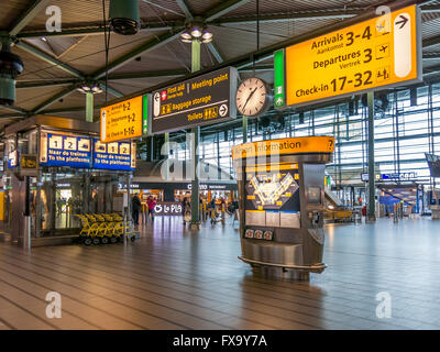 Signs in train station Schiphol Plaza of Schiphol Amsterdam Airport, Netherlands