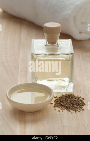 Bottle with anise oil and seeds for aroma therapy Stock Photo