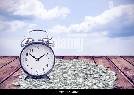 Composite image of retro alarm clock Stock Photo