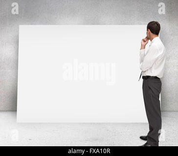 Composite image of thoughtful classy businessman looking away Stock Photo