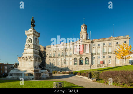 Statue of Prince Henry the Navigator and Stock Exchange Palace in Porto, Portugal. Stock Photo