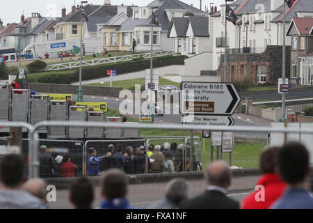 Thursday 13th May 2014 - Vauxhall International North West 200. Evening races - Superstock Qualifying - crowds watch Alastair Seeley (34) on the drop down to York Corner on the famous Triangle Circuit, last race of the evening. Stock Photo