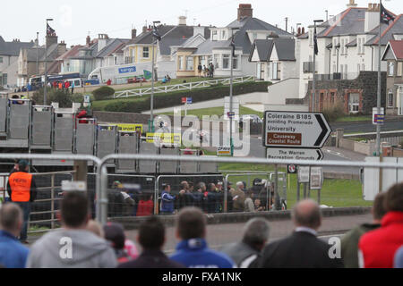 Thursday 13th May 2014 - Vauxhall International North West 200. Evening races - Superstock Qualifying - crowds watch Didier Grams (26) and Phillip Crowe (43) on the drop down to York Corner on the famous Triangle Circuit, last race of the evening. Stock Photo