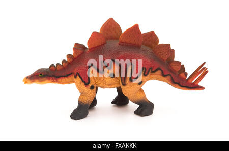 side view red stegosaurus toy on a white background Stock Photo