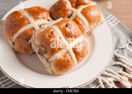 Hot Cross Buns traditionally eaten hot or toasted during Lent Stock Photo