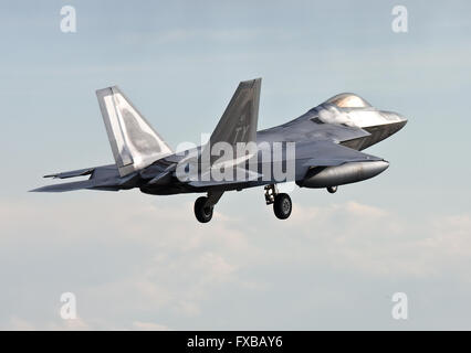 Tyndall AFB based USAF F-22 Raptor landing at RAF Lakenheath, England Stock Photo