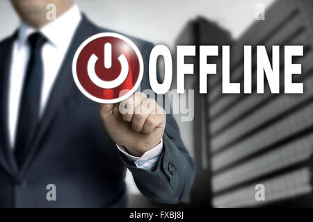 offline touchscreen is operated by businessman. Stock Photo