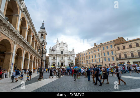 tourists and pilgrims in front of famous Shrine of the Holy House church in Loreto, Italy. Stock Photo