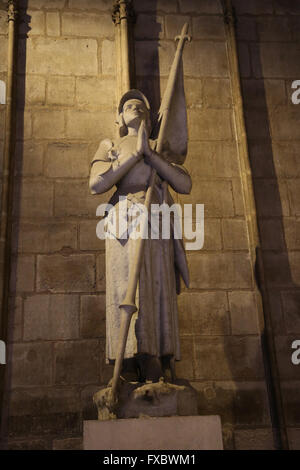 Statue of Joan of Arc (1412-1431). by French sculptor Charles Desvegnes (1860-1928). Interior Notre-Dame. Paris. France. Stock Photo