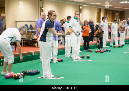 Melton Mowbray, Leicestershire,UK. 13th April 2016. English Indoor Bowling Association National Championships held at Melton and District Indoor Bowls Club. The quarter finals of the ladies and mens Nationa triples teams being played out. Credit:  Jim Harrison/Alamy Live News Stock Photo