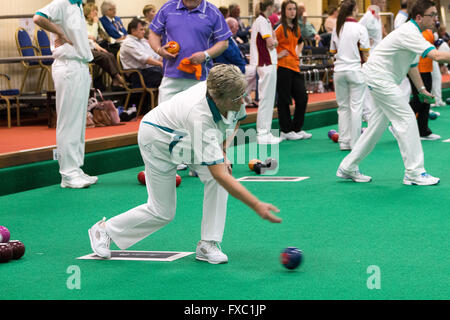 Melton Mowbray, Leicestershire,UK. 13th April 2016. English Indoor Bowling Association National Championships held at Melton and District Indoor Bowls Club. The quarter finals of the ladies and mens Nationa triples teams being played out. Credit:  Jim Harrison/Alamy Live News Stock Photo