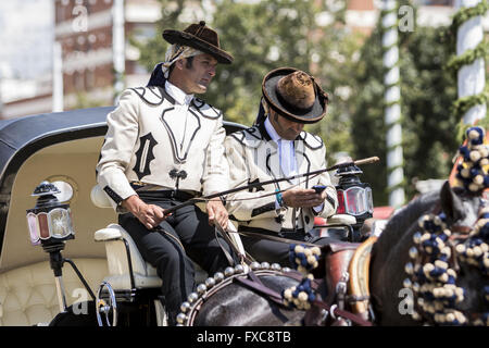 Seville, Spain. 14th Apr, 2016. Charriot drivers at the ''Feria de Abril'' (April's Fair) 2016 © Daniel Gonzalez Acuna/ZUMA Wire/Alamy Live News Stock Photo