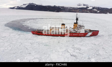 United States Coast Guard Heavy Icebreaker Polar Star clears ice from Waterquarters Bay during operation Deep Freeze January 20, 2016 at McMurdo Station, Antarctica.