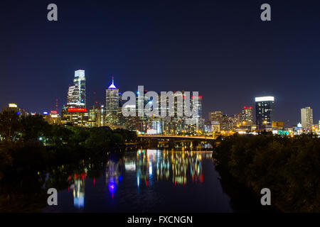 The skyline of Philadelphia is seen in this image, reflected in the river. Stock Photo