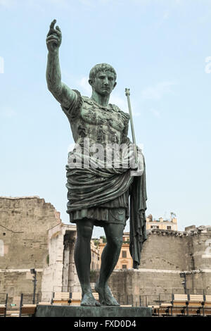Ancient statue S.P.Q.R. IMP CAESAR Augustus PATRIAE PATER. Via dei Fori Imperiali street, Rome, Italy Stock Photo