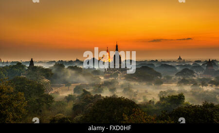 Scenic sunrise above Bagan in Myanmar. Bagan is an ancient city with thousands of historic buddhist temples and stupas.