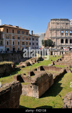 Italy, Rome, Ludus Magnus and Colosseum Stock Photo