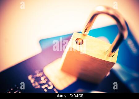 Not Safe Payments Concept. Padlock on Credit Cards Closeup Photo Concept. Stock Photo