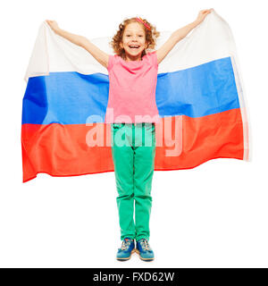 Cute curly-haired girl waving a Russian flag Stock Photo
