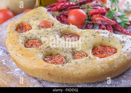 Traditional italian focaccia with cherry tomatoes Stock Photo