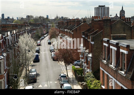 Edwardian houses, view looking down onto street. Calabria Road with cars belonging to middle class professionals families, family homes in Islington north London. Rooftops skyline England Uk 2016 2010s  HOMER SYKES Stock Photo